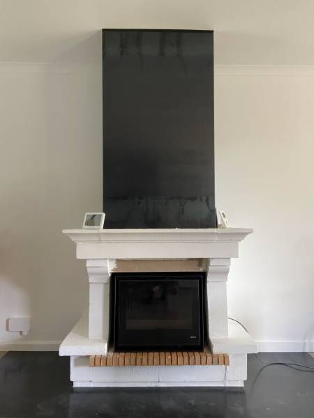 Installation d’un insert ventilé en fonte avec simple face de la marque SEGUIN à Charentay dans le Rhône